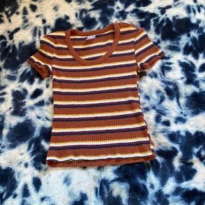 Brownish orange background with yellow, white, red & dark blue combined stripes.